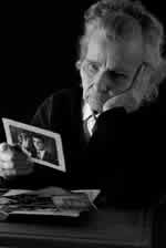 Lady looking at old photographs